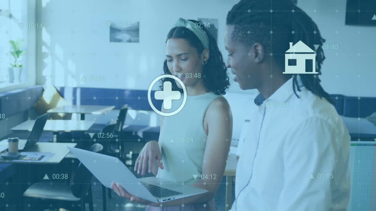 Animation of icon and changing numbers over diverse coworkers discussing reports on laptop in office