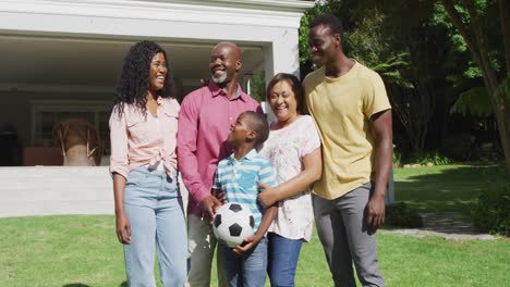 Animation-of-happy-african-american-family-posing-to-photo-in-garden