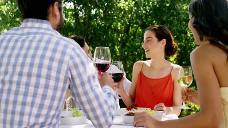 Group-of-friends-toasting-wine-glasses