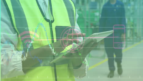 technicians using tablet and walking on factory floor, showing charts and wi?fi icon
