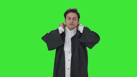 Indian-lawyer-wearing-gown-and-getting-ready-Green-screen