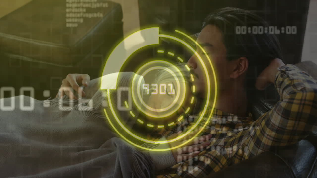 Yellow digital interface animation over person relaxing and reading on couch