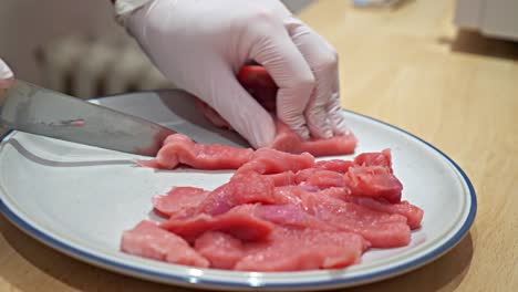 raw meat is cut into long strips