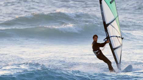 Male-surfer-windsurfing-in-the-beach-4k