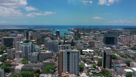 aerial view port louis on beautiful sunny day. capital of the island of mauritius. tall buildings on the indian ocean. offshore banking system