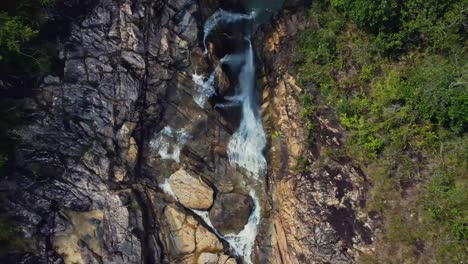 Aerial-over-Big-Rock-Falls-in-the-Mountain-Pine-Ridge-Forest-Reserve,-Belize