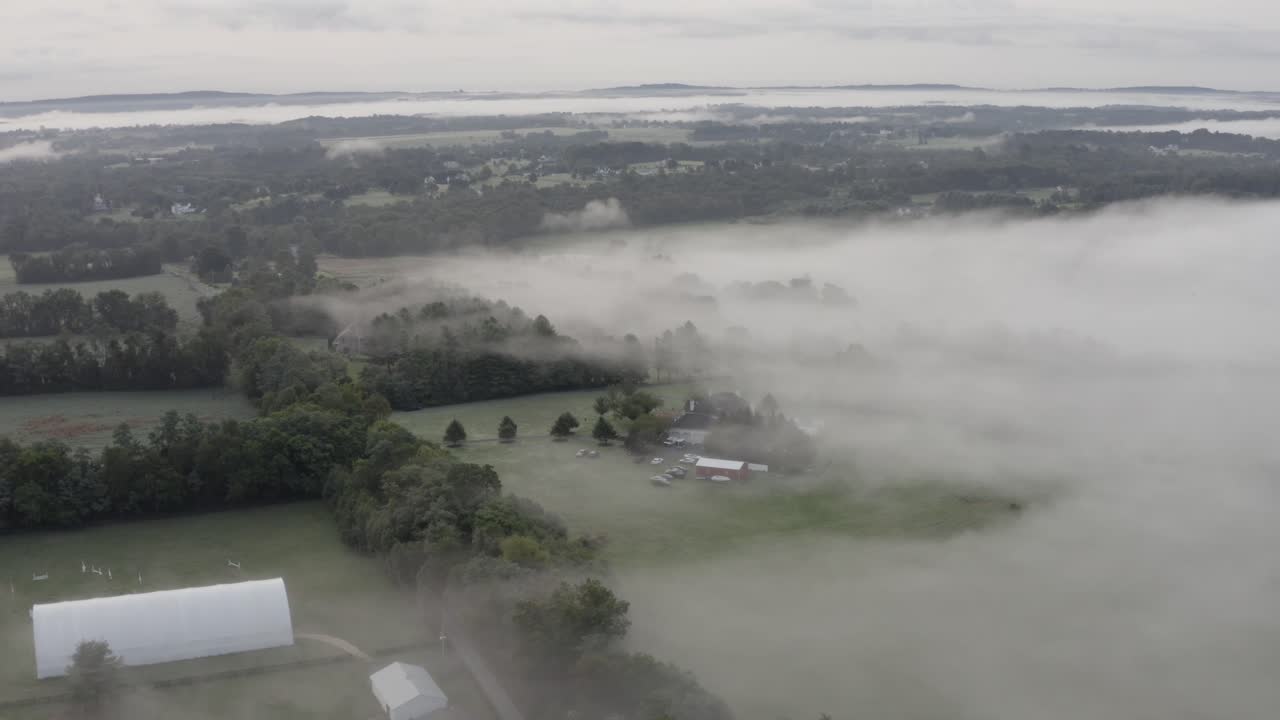 DJI Mavic 2 Pro shot of Mist from a mountain area flowing into a valley region in 4K24p D-Log.