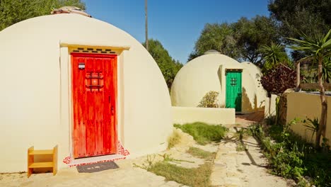 footage of isolated luxury glamping tents in a remote field