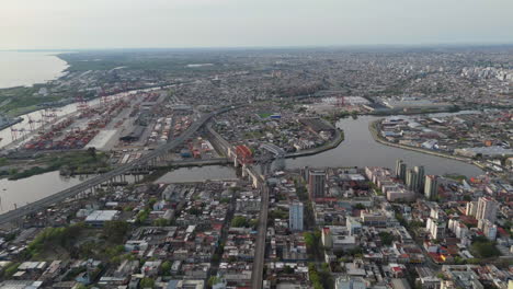 aerial view of a city with a port and river