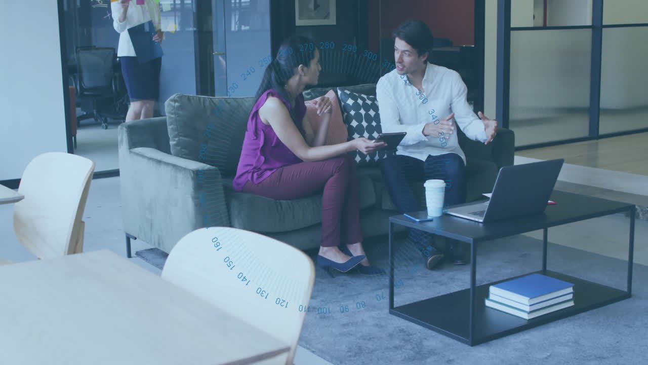 two colleagues discussing business strategy in office lounge, with floating charts and phone icons