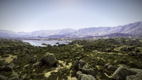 breathtaking landscape showcasing a serene lake surrounded by rocky hills