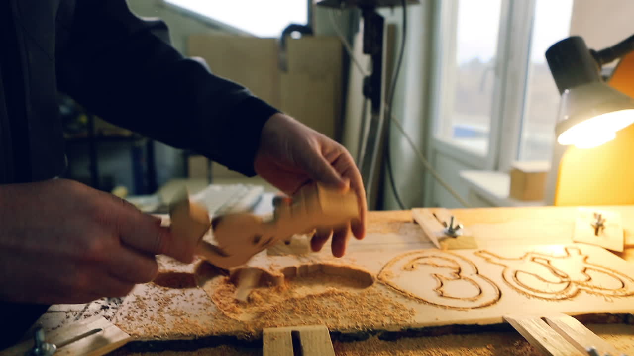 Wood Cut Machine Moves Above Working Table. Industrial wood cut machine moves above working table and drills