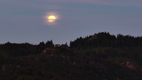 aerial view the moon at night over san carlos de bariloche in argentina.