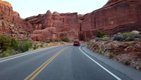 POV-footage-of-driving-in-the-Arches-National-Park-in-Moab,-Utah