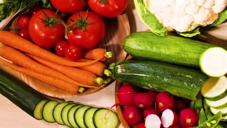 assorted vegetables displayed on a black background