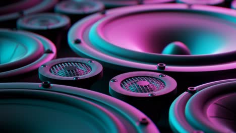 Vibrating-speaker-membranes-stacked-in-an-endless-loop.-Lit-by-soft,-moody-studio-lights.-Powerful,-modern-kind-of-midrange,-subwoofer-and-twitter-loudspeakers-vibrate-in-even,-pulsating-frequencies.