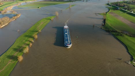 floodwaters and a ship on a river