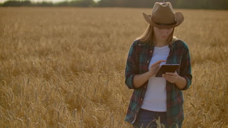 A-woman-farmer-with-tablet.-Smart-farming-and-digital-agriculture.