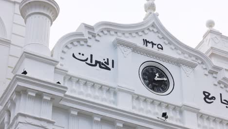 galle fort - meeran jumma masjid. sri lanka. clock on the mosque close-up. snow-white beautiful mosque building in galle fort. slow motion 120 fps video, prores 422, 10 bit