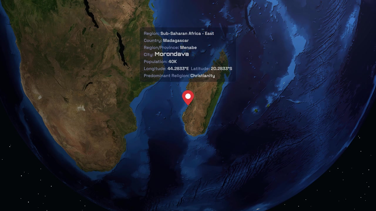 Digital globe rotates and zooms into Madagascar, revealing location pin and regional demographic information