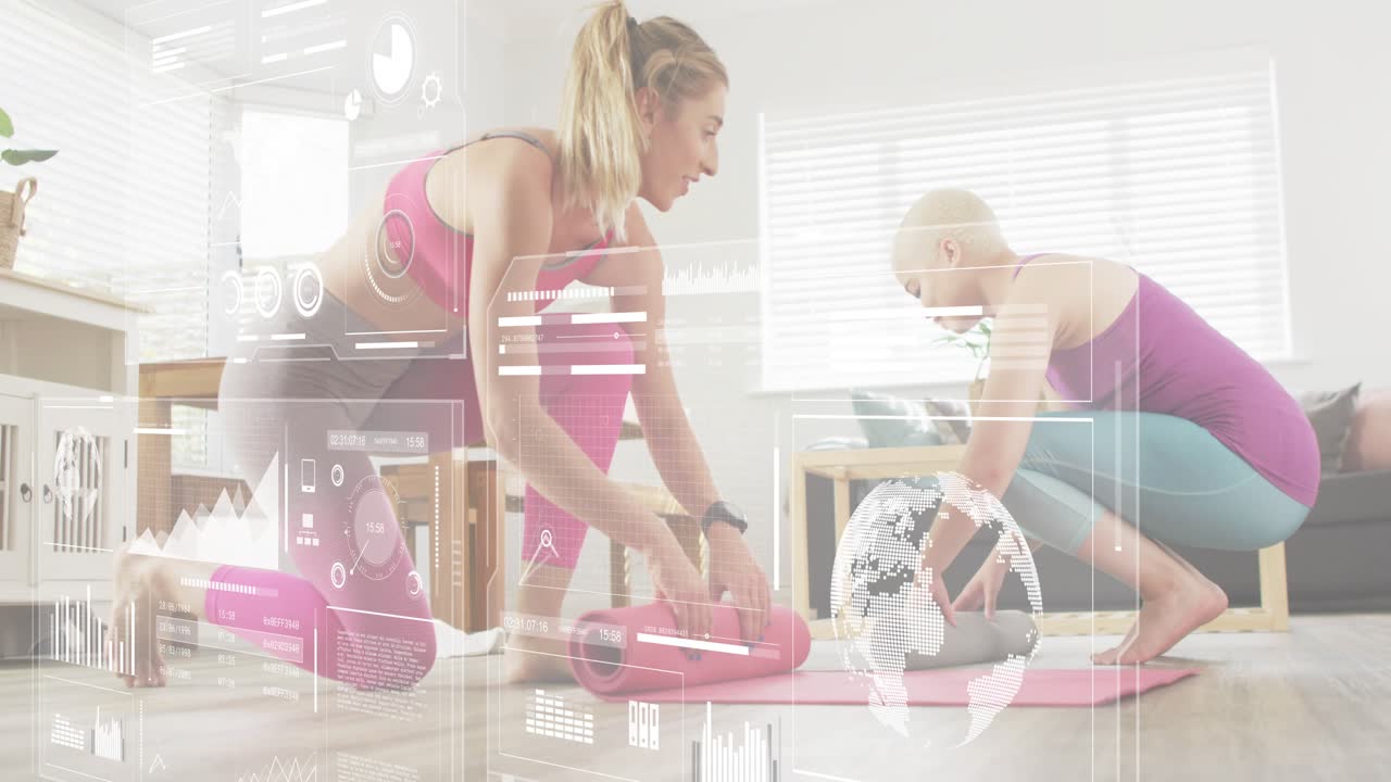 Gripping rolled yoga mats, two women kneeling and unrolling mats for home fitness preparation