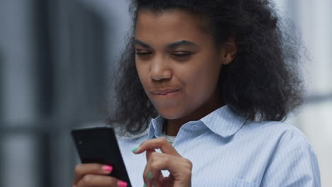 thoughtful woman texting friend pose at office closeup. online communication.