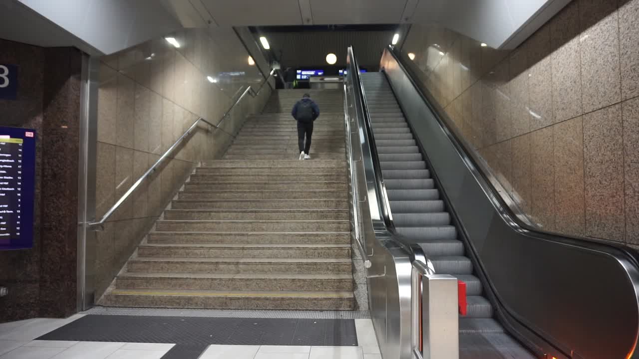 Going upstairs on a train station in Duesseldorf