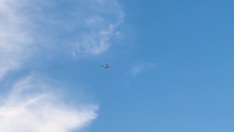 sunset flight: majestic airplane soaring through ethereal sky with dramatic clouds