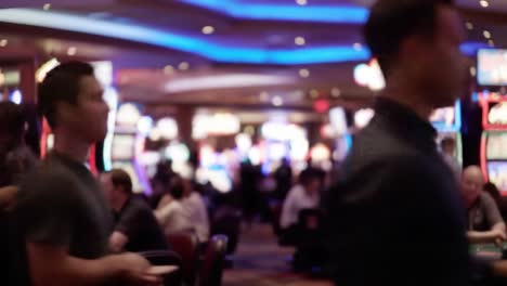 a vibrant and lively casino scene captured in two framed moments, showcasing gamblers and croupiers in action amidst colorful slot machines and bright lights
