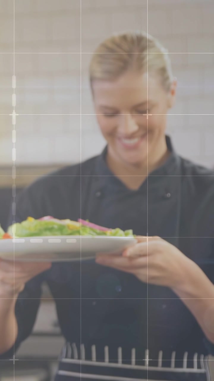 Chef inspecting salad bringing plate forward angling to viewer presenting HUD overlays showing data