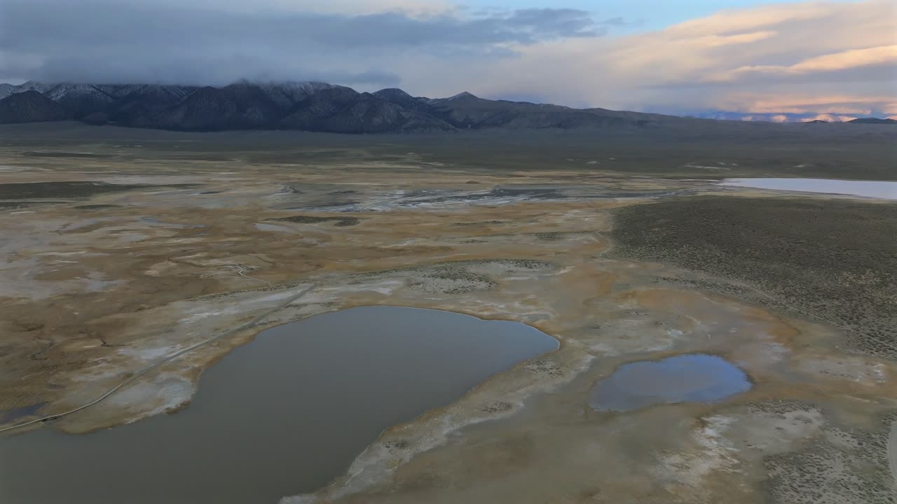 Mammoth Lakes Convict Canyon Minarets Sierra Nevadas mountain range Hilltop Wild Willy's Hot Springs California aerial drone winter vibrant sunset Benton Crossing Long Valley Caldera circle right