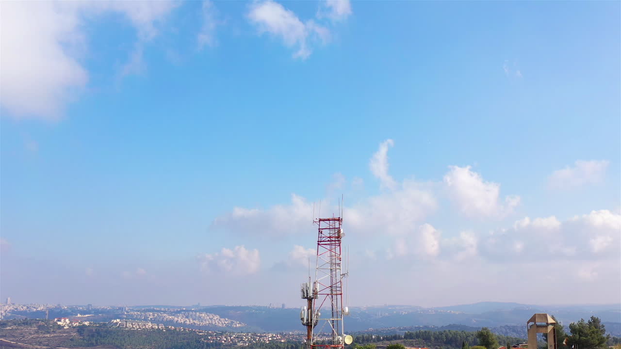 Aerial footage Close to Radio and cellular Antenna With blue sky