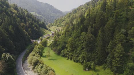 reveal of a european style church in the mountainous valley of slovenia