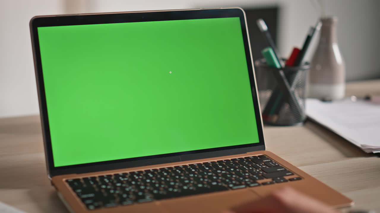 Woman surfing greenscreen laptop at company workspace closeup. Female hands