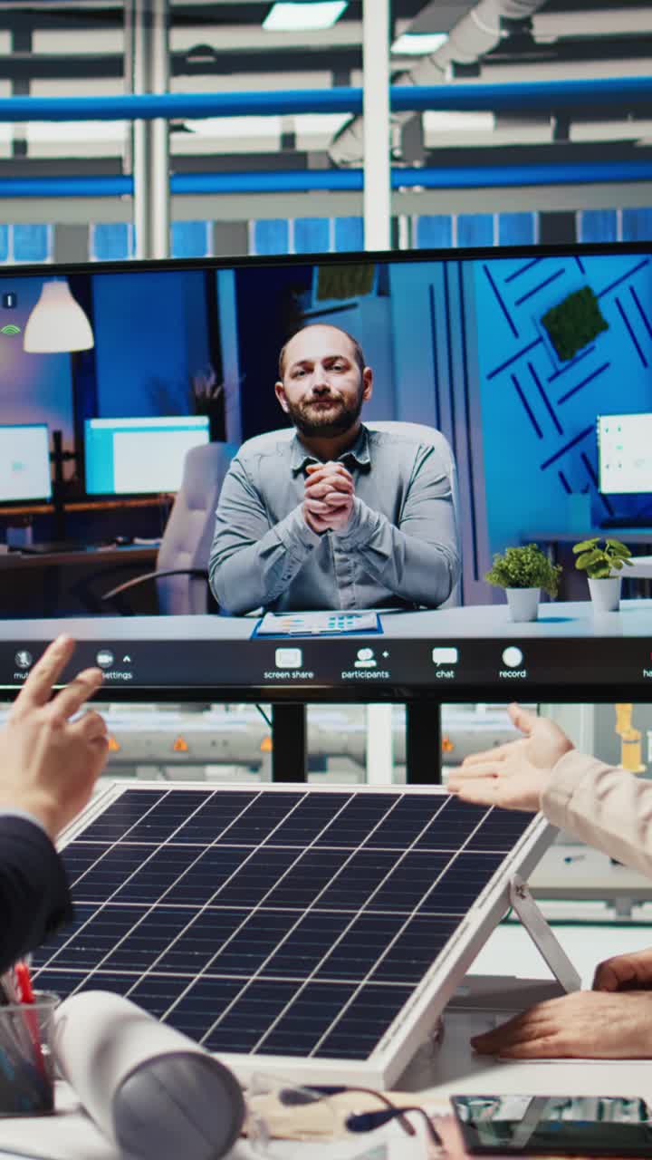 Vertical video Photovoltaics plant researchers doing videocall to optimize energy production