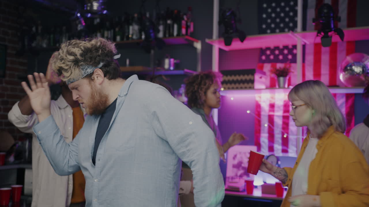 Friends Dancing at a Night Party