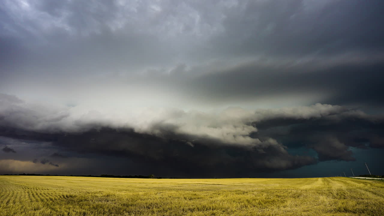 Big storm moving closer with farmed fields in view