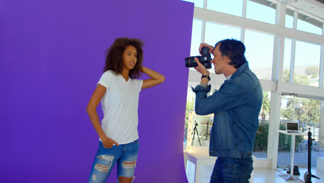 female model posing for a photoshoot in the studio 4k