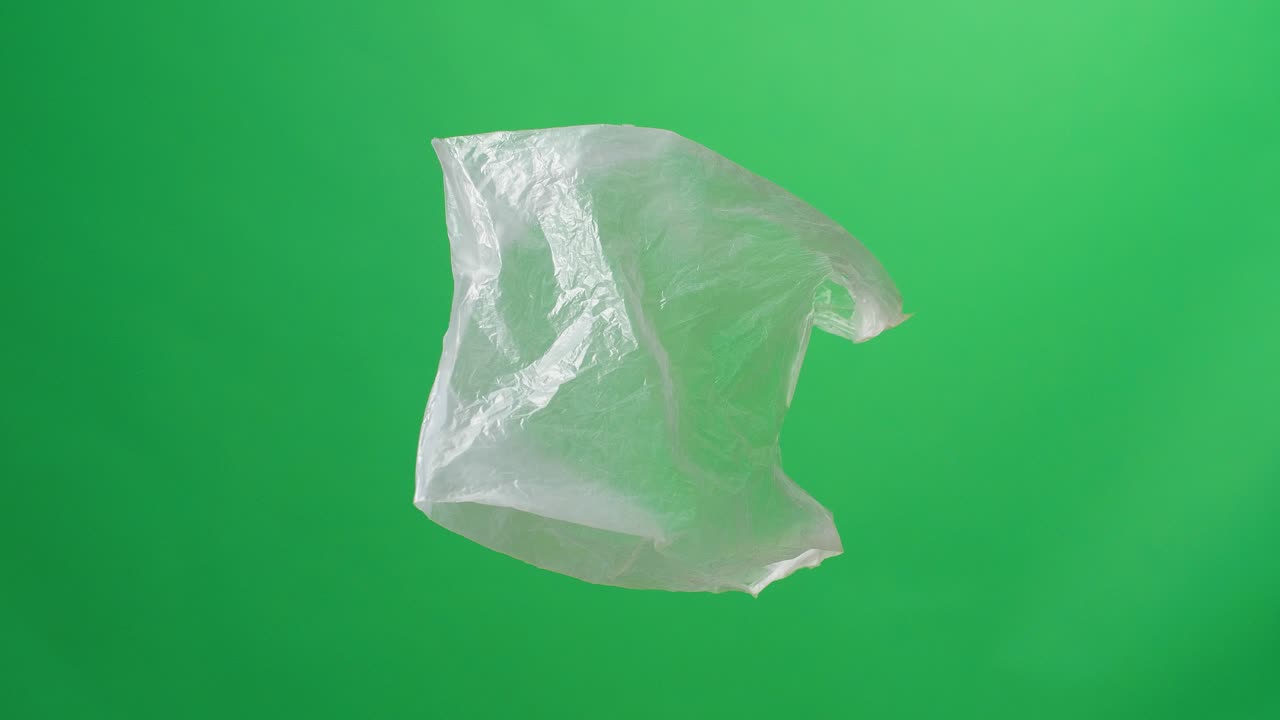 Plastic Bag Rotating On Green Screen Background