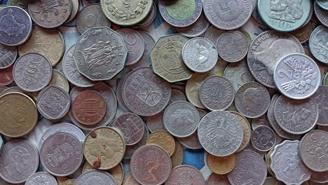 pile world coins from different countries