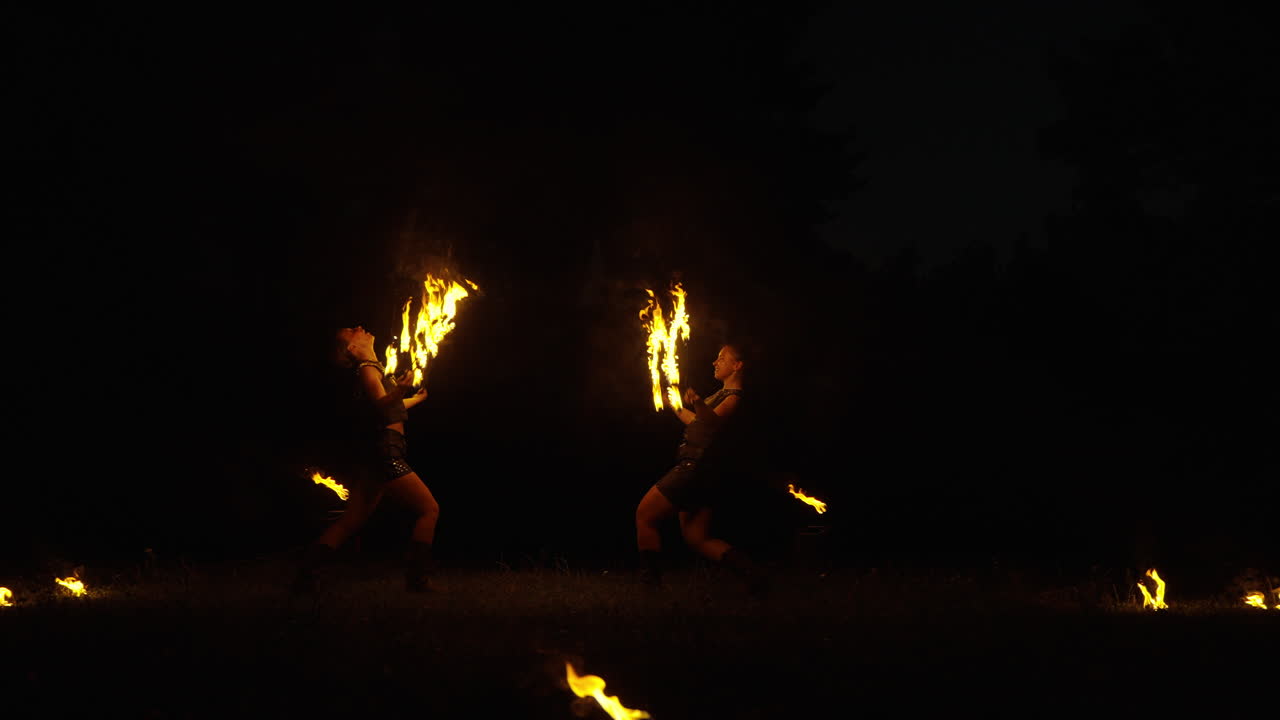 Fire Dancers at Night