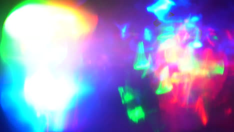futuristic waves, soft light reflections light leaks from disco ball. projection on the wall. fast moving abstract colorful particles, reflections, shadows 4k footage.