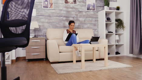 Woman-taking-notes-on-clipboard