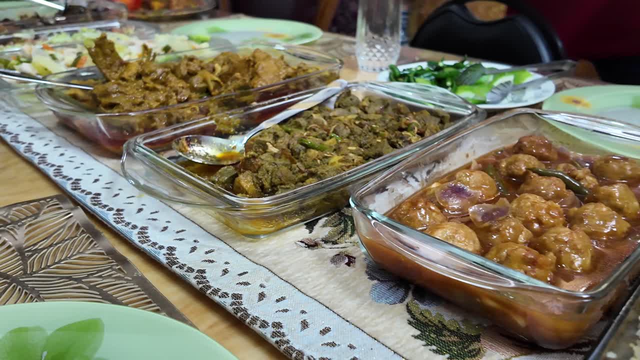 Family Dinner Table with Various Dishes