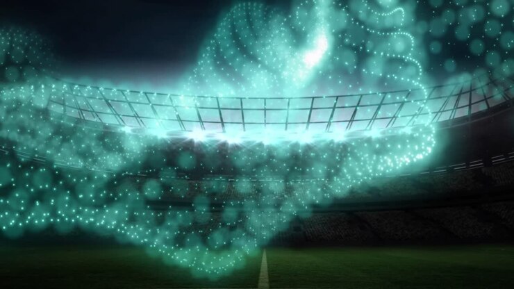 Animazione di una rete di particelle luminose che si muovono sopra uno stadio sportivo illuminato.