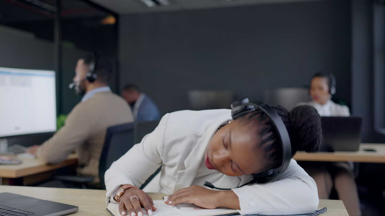 Call center, tired black woman