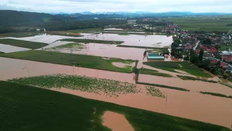 Horrific-Aerial-4K-Drone-footage-of-flooded-villages-in-Podravje,-Slovenia,-during-August