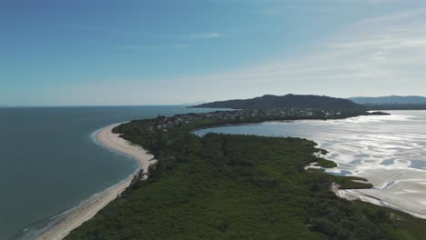 Drone-image-going-up-and-discovering-Daniela-beach,-in-Florianopolis,-the-island-of-magic