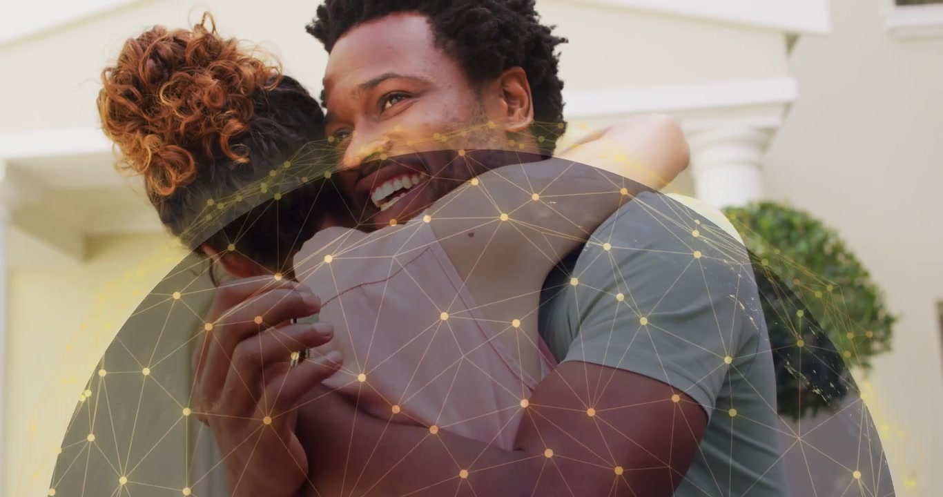 Couple embracing at porch, arrival sparking reunion as rotating tech overlay layering over couple