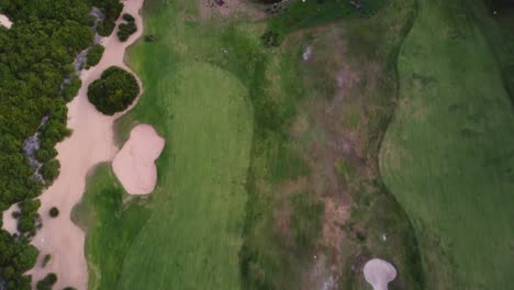 drone pan shot across greens with sand bunkers shelly beach golf course central coast nsw australia 3840x2160 4k